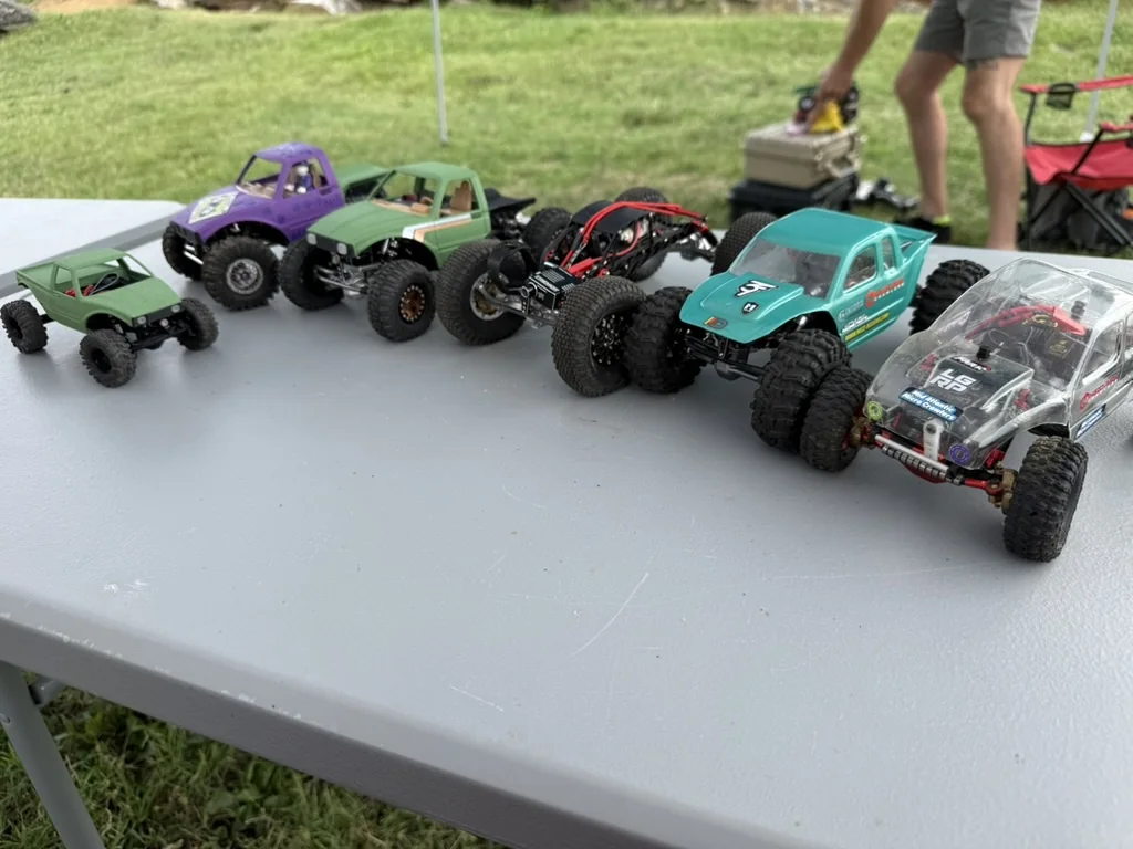 RC crawlers lined up before the August 1 competition