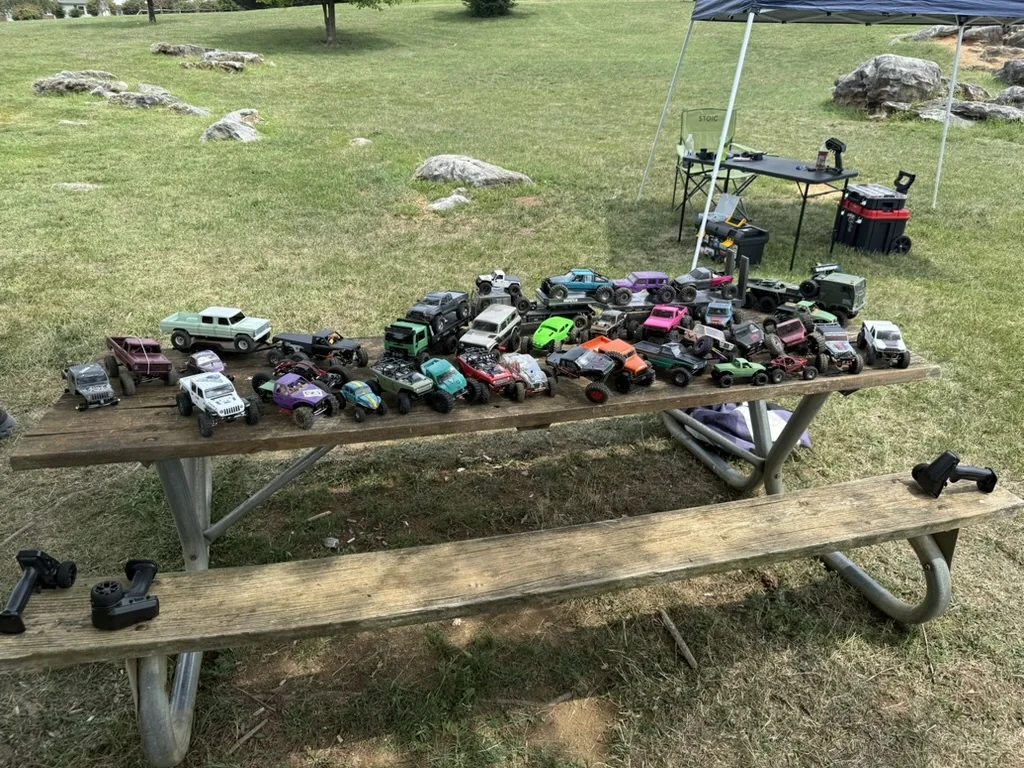 Competition crawlers displayed on a picnic table